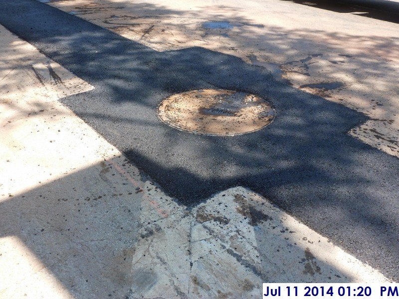 Paved manhole at Rahway Ave. Facing the new Court Building (800x600)